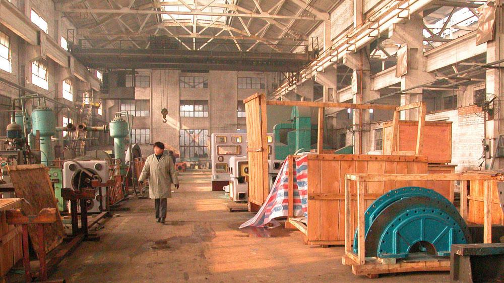 A Woman Walking Alone in an Air Separation Factory in China 
